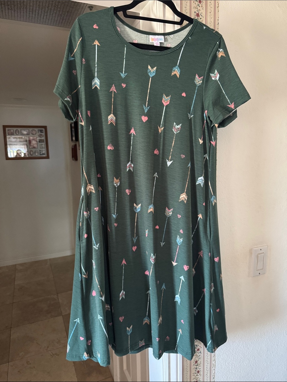 LuLaRoe Jessie Green Arrow Heart Print Top